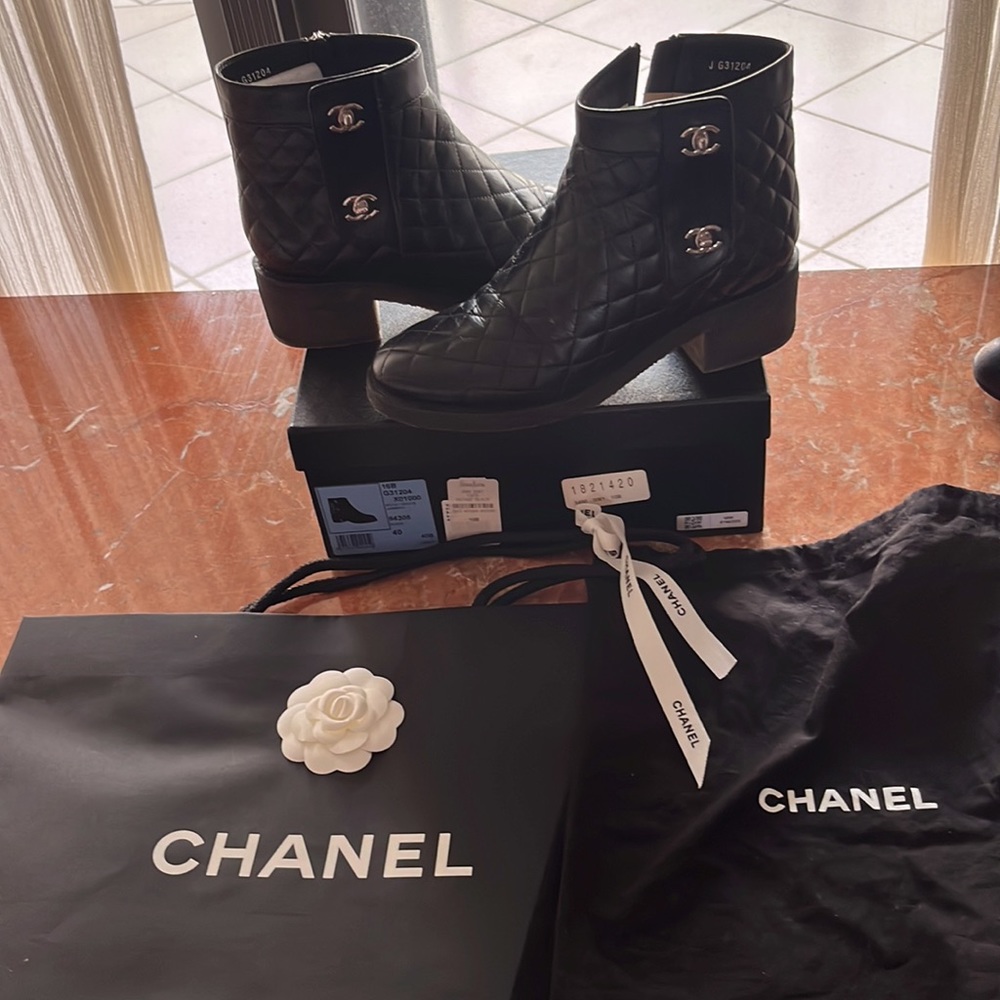 Authentic Chanel buckle booties. super comfortable has gel shock absorbent soul